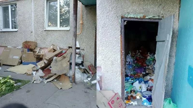 Горы мусора вдоль стены подъезда, запахи и антисанитария вынуждают жильцов требовать вывоза мусора и ремонта мусоропровода.